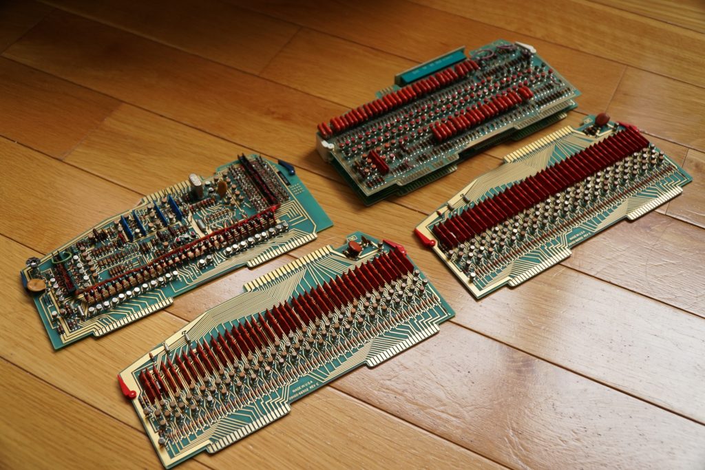 Logic Boards: uOP Decoder/Clock Generator(Top Left), Magnetic Core Memory Assembly (Top Right), J-K Flip-Flops (Bottom Two)